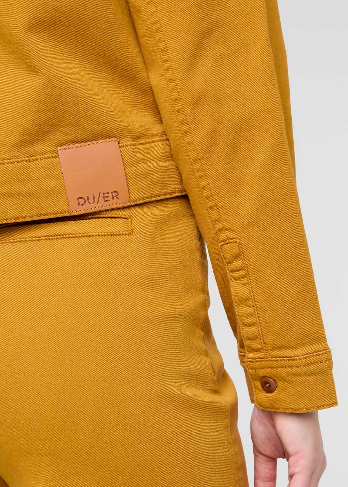 womens yellow cotton trucker jacket back patch and sleeve detail