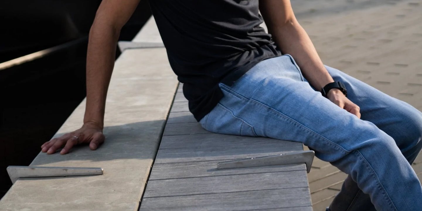 Man wearing DUERs sitting