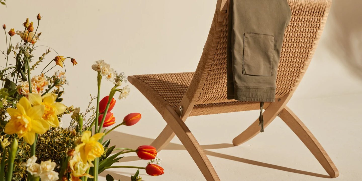 DUER jeans stacked on top of each other