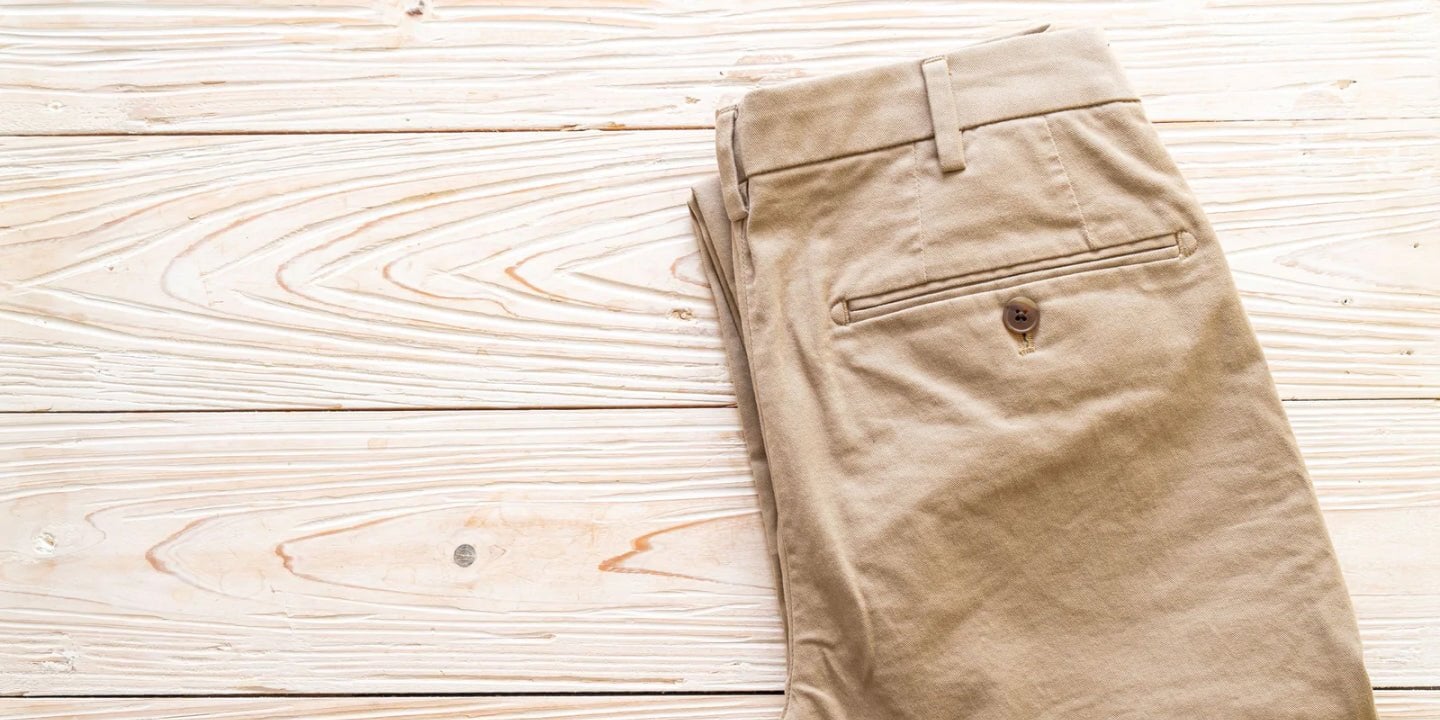 a pair of beige DUER pants