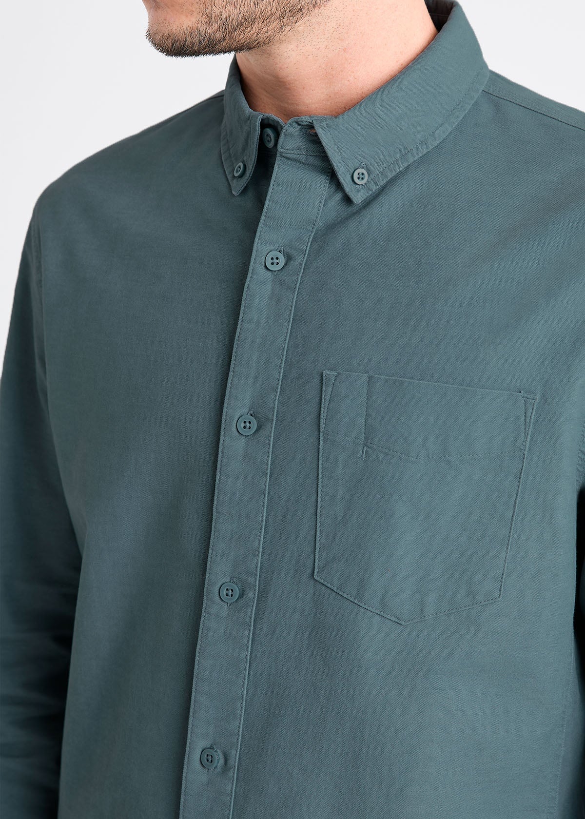 mens blue stretch button down shirt chest pocket detail