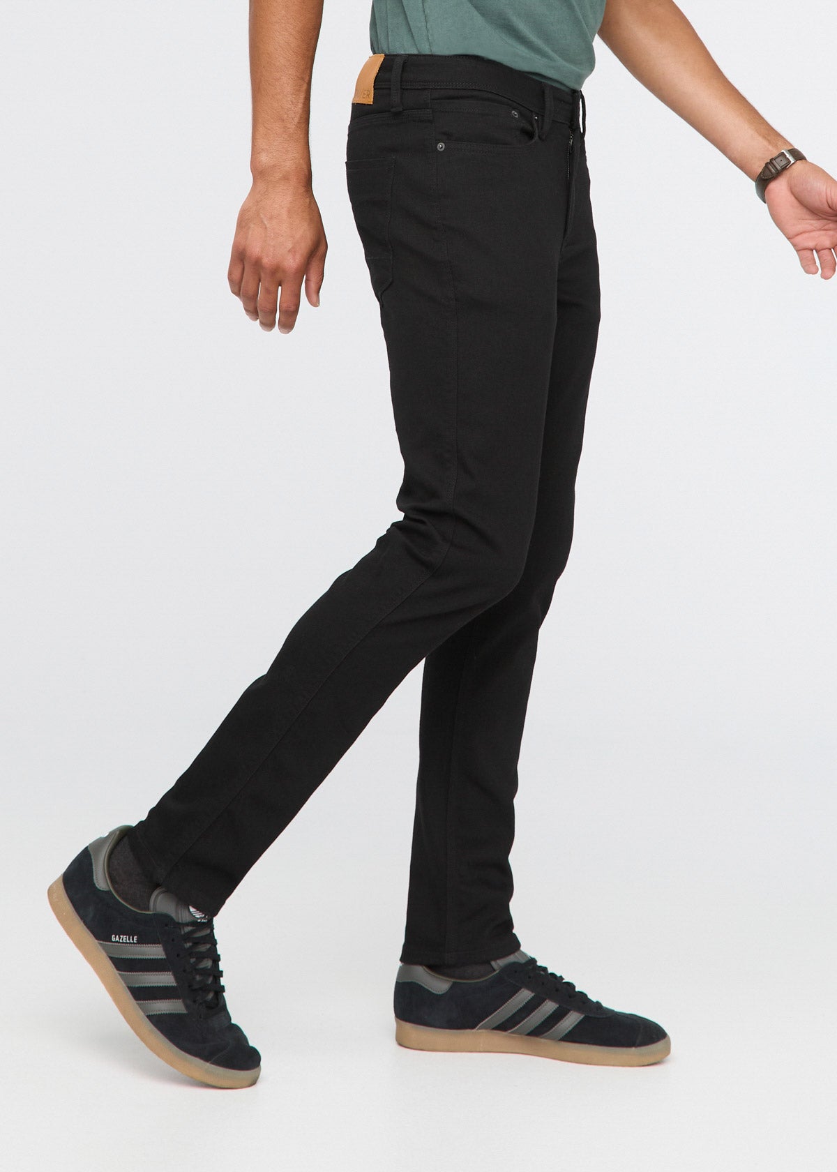 black slim fit stretch jeans side