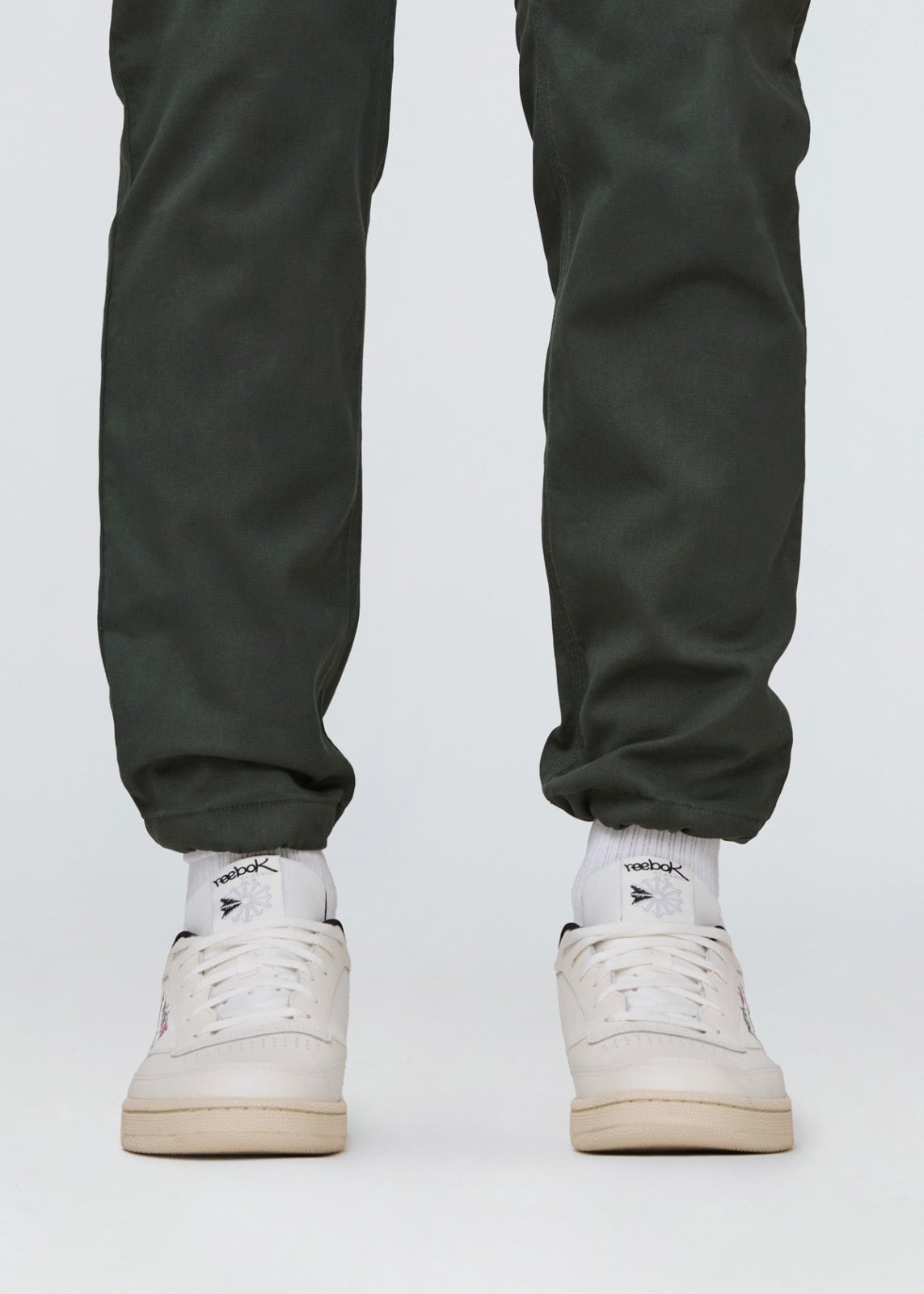 mens relaxed dark green water resistant cargo pant synched ankle detail