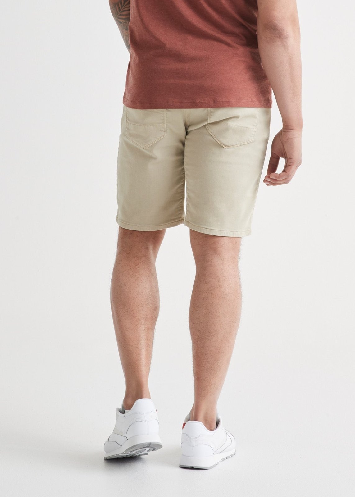 mens off-white relaxed fit performance stretch short back