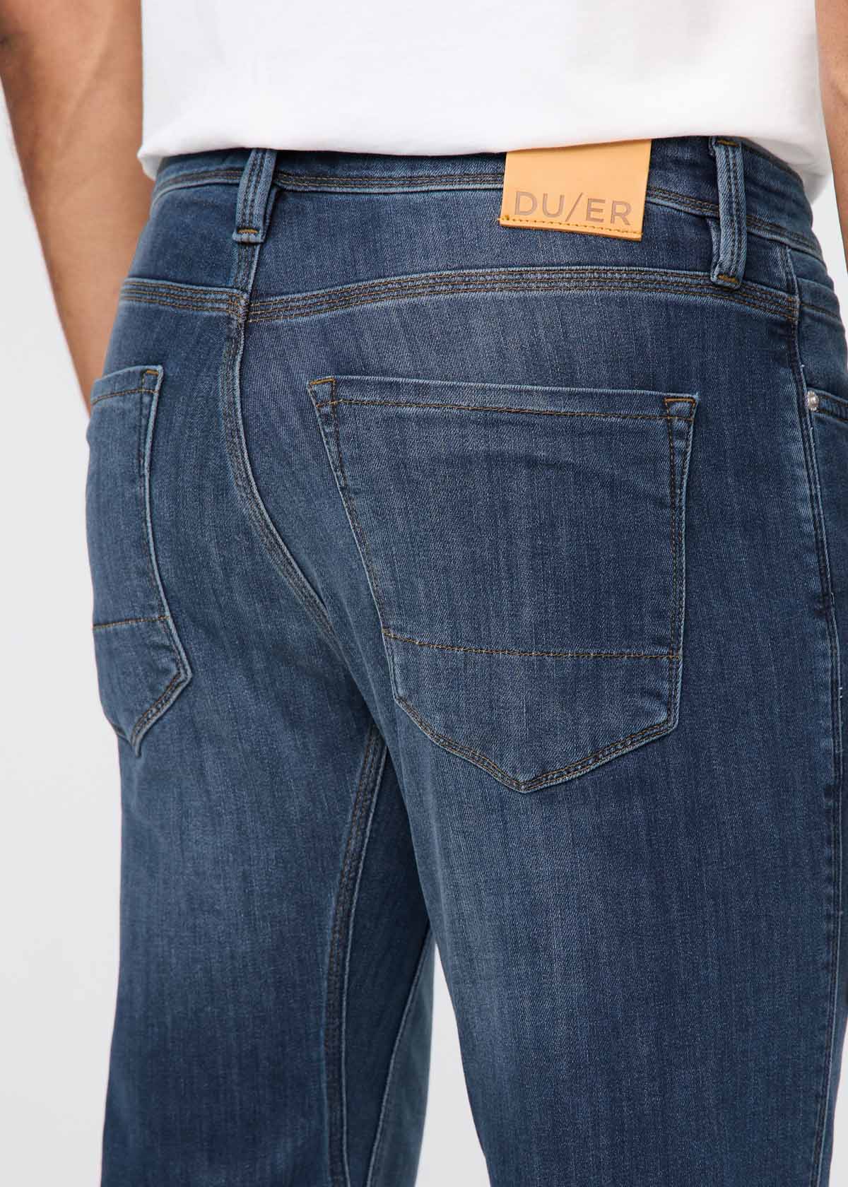 mens medium wash slim fit stretch jeans back pocket detail