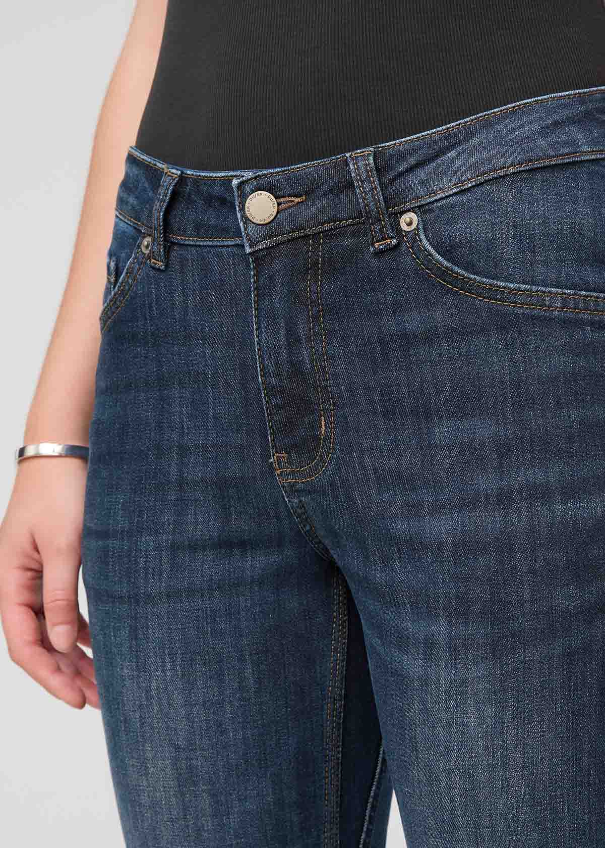 womens blue mid rise relaxed stretch jeans front waistband detail