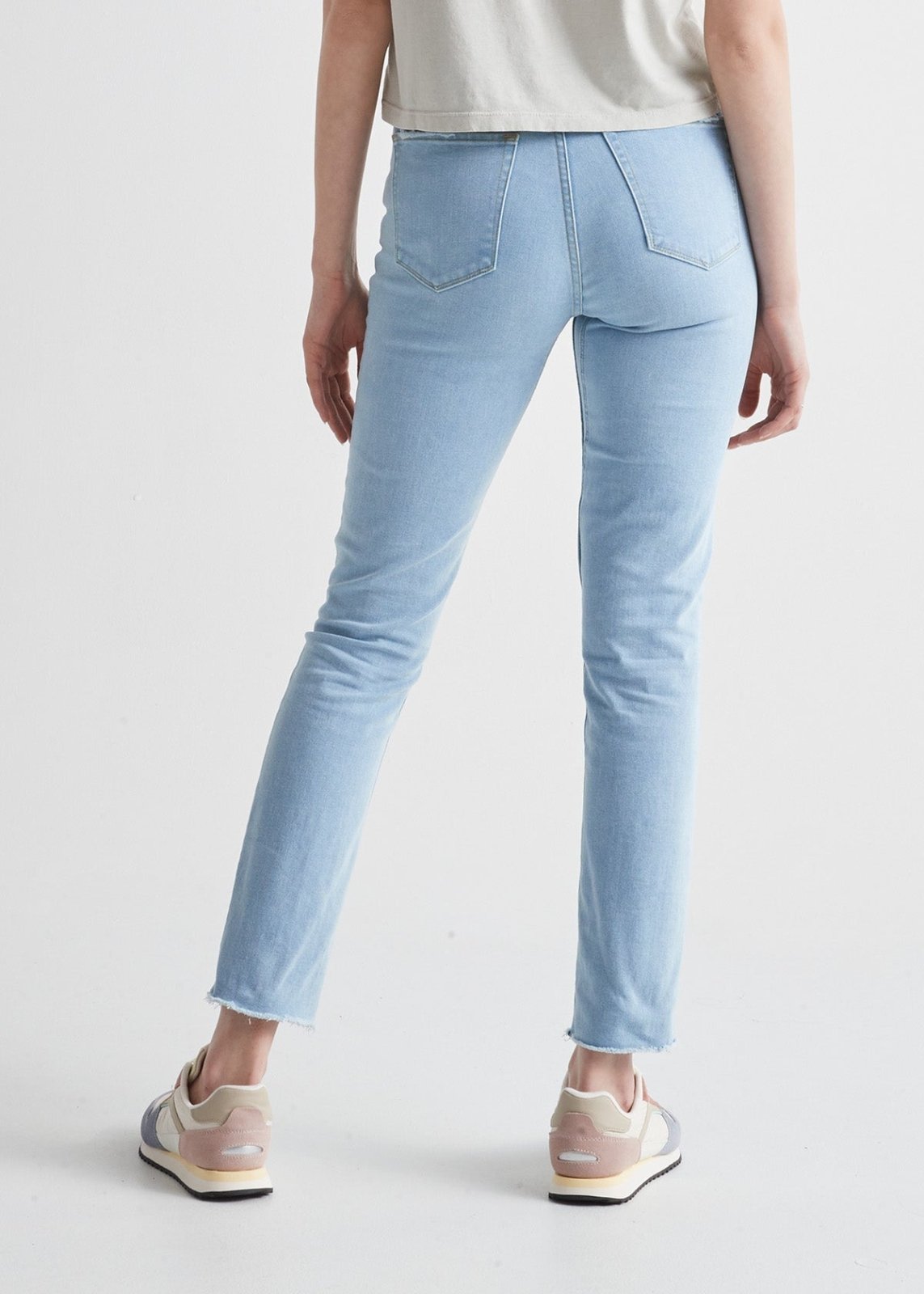 womens midweight denim light wash high rise slim jean back