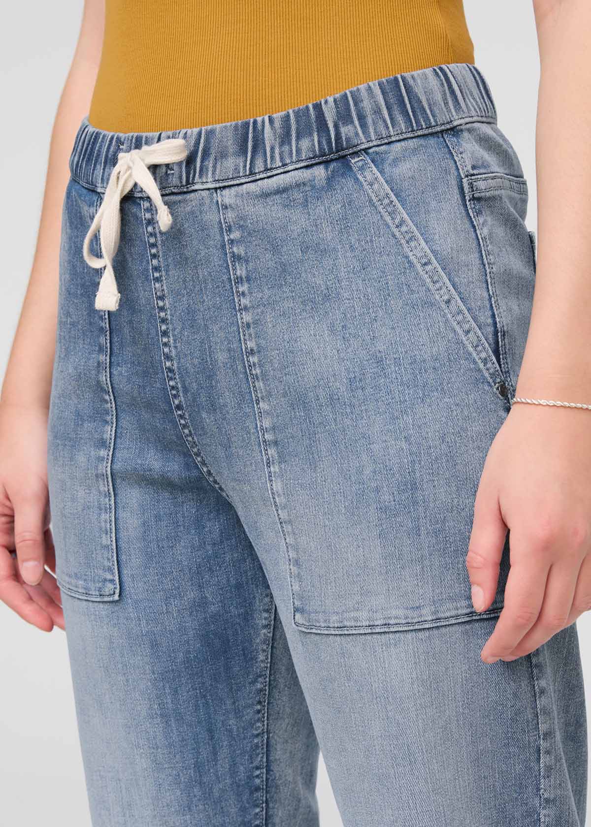 womens faded blue relaxed pull on denim pants front drawstring detail