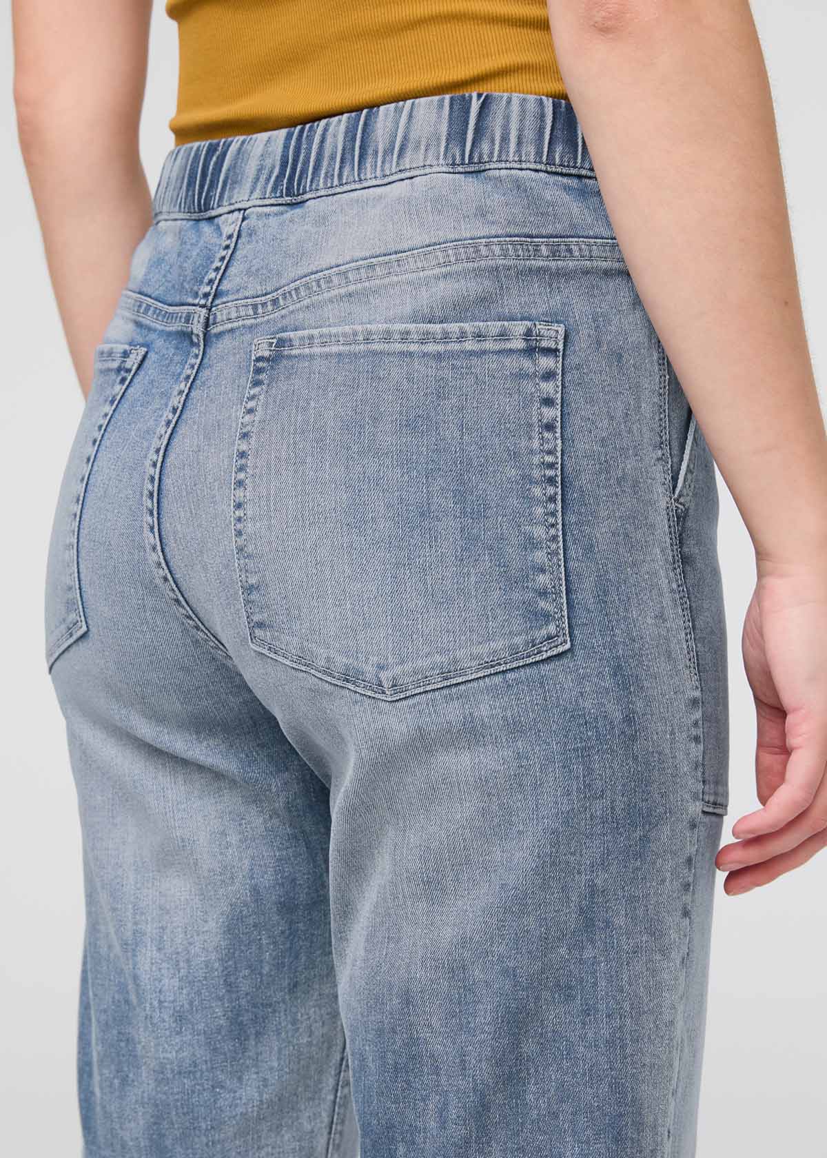 womens faded blue relaxed pull on denim pants back waistband detail
