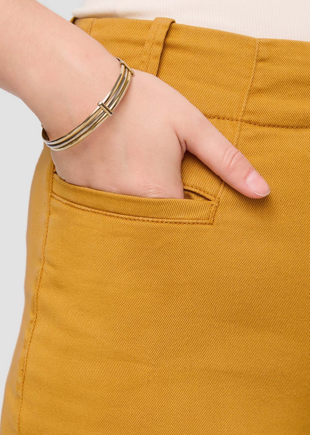 womens yellow high rise trouser front pocket detail