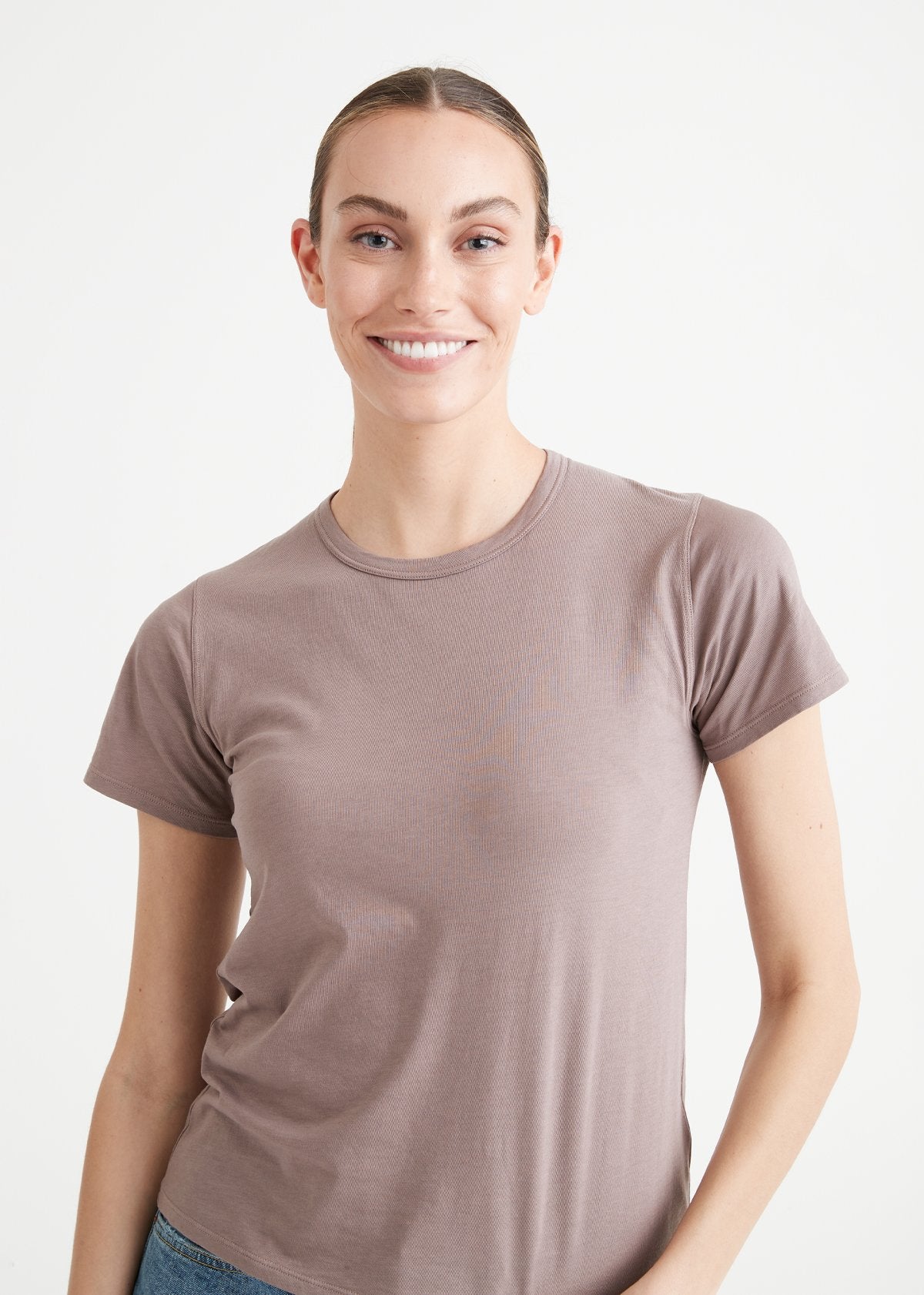 Women's light brown lightweight soft crew tshirt front smiling