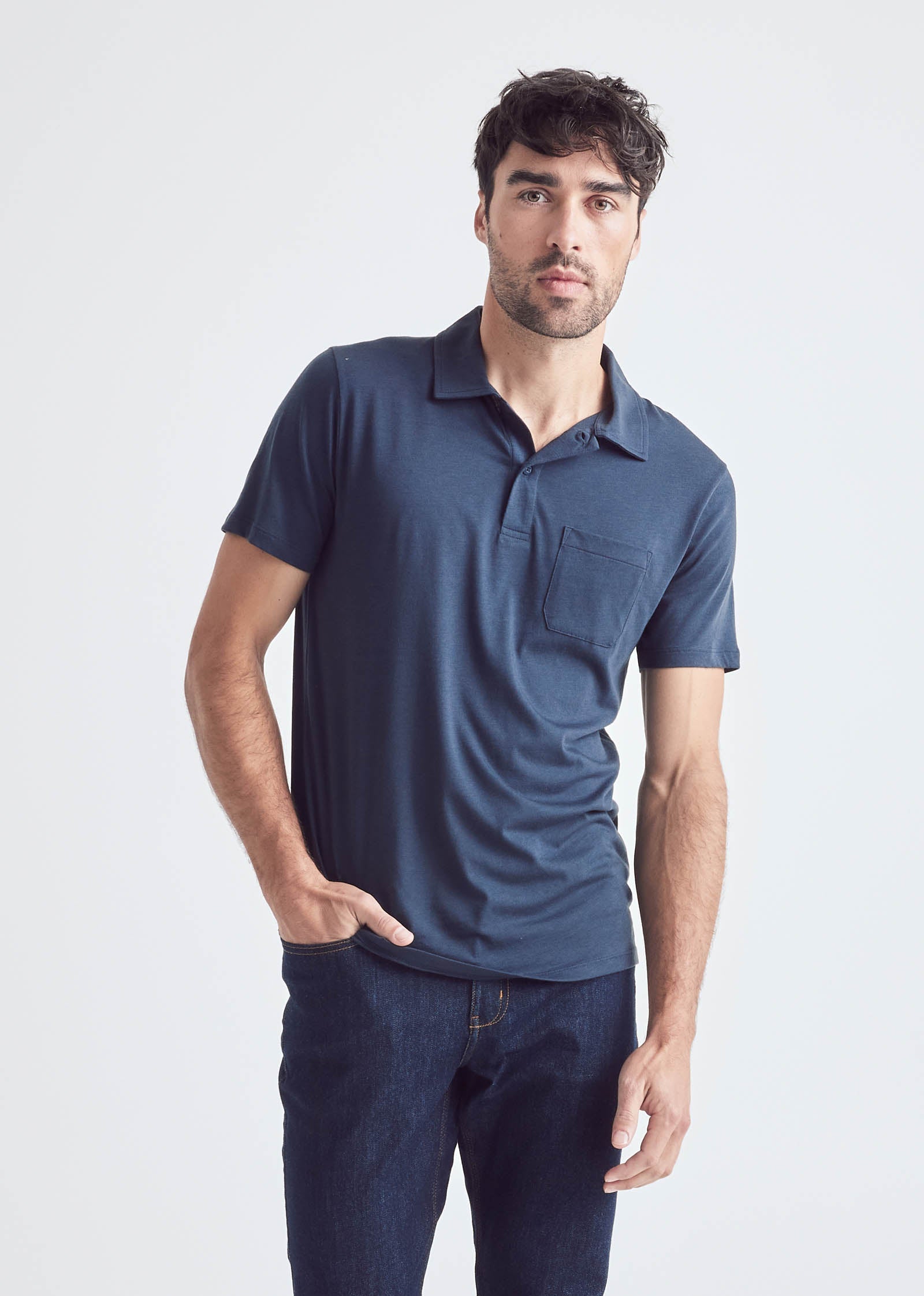 mens navy soft lightweight polo hand in pocket