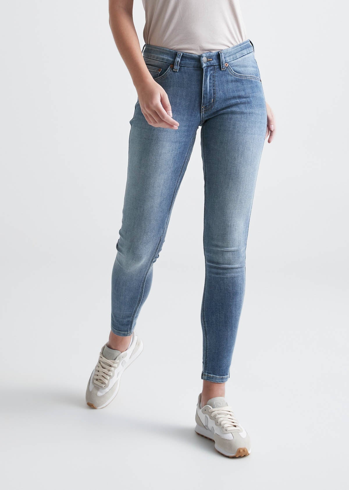 womens light blue mid rise skinny stretch jeans front